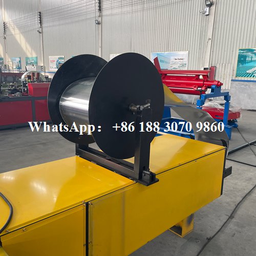 seamless gutter machine rear view showing feeding system